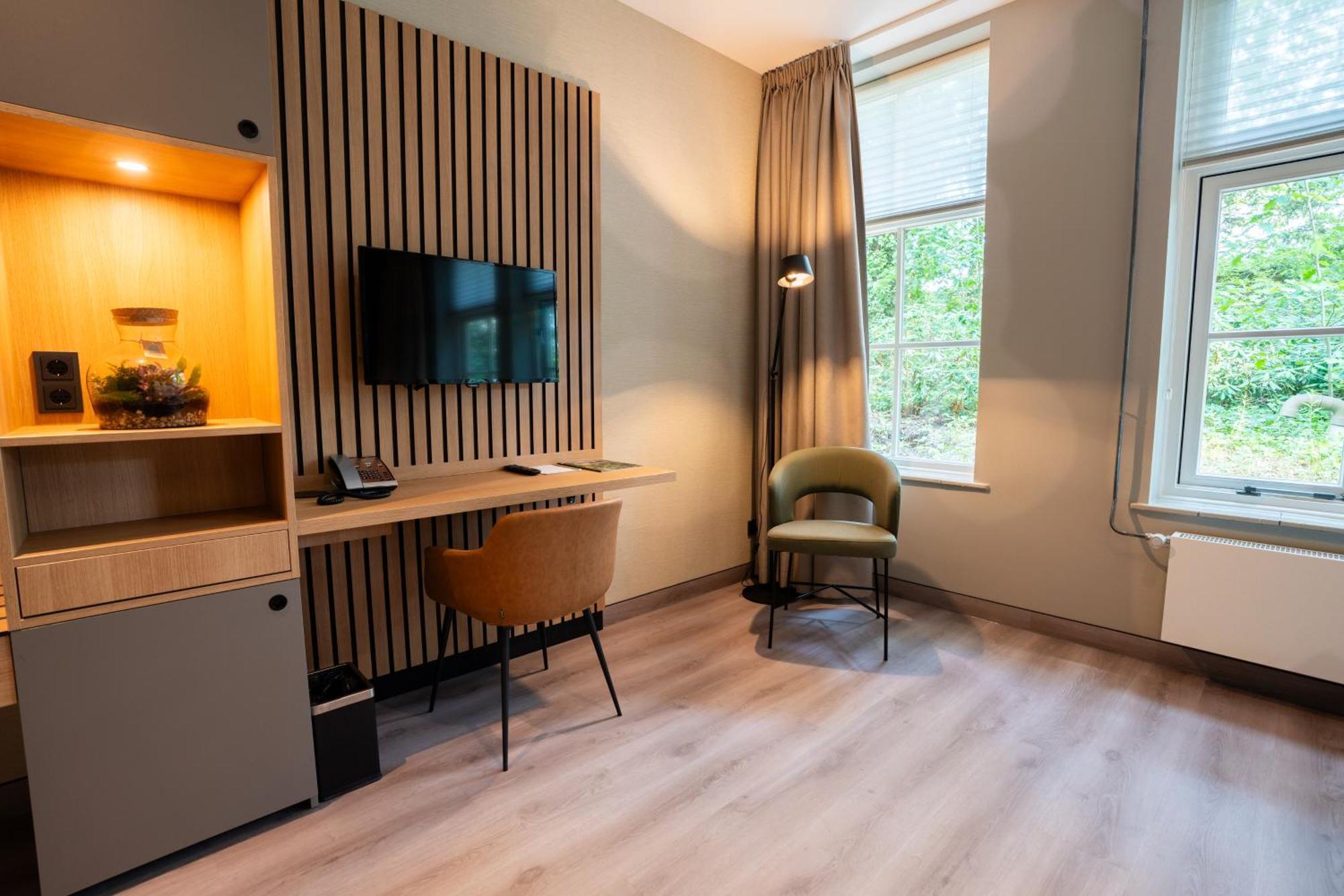 Hotel Kontakt Der Kontinenten Soesterberg Esterno foto
